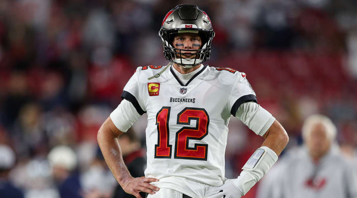 Buccaneers quarterback Tom Brady (12) looks on before a wild-card game against the Cowboys at Raymond James Stadium.